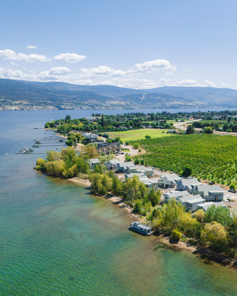 Drone image of lakefront homes and beachfront on Okanagan Lake near Summerland British Columbia