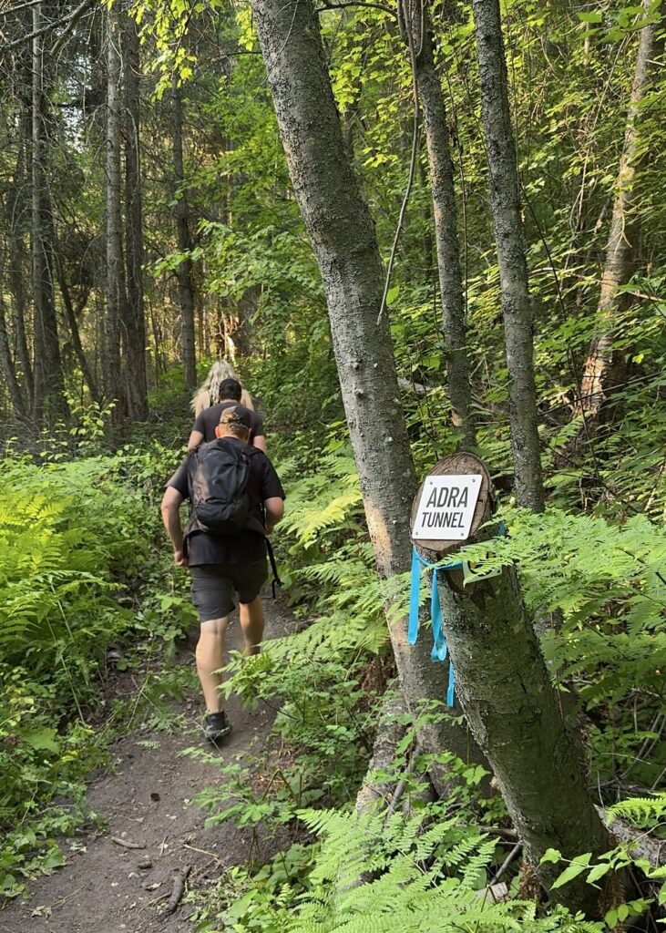 3 friends hike to the Adra Tunnel in Naramata British Columbia from the Smethurst access point